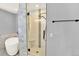 Spa-like bathroom with glass-enclosed shower and a luxurious soaking tub at 11575 Wilson Cir, Parker, CO 80134