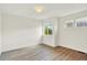 This bedroom is brightly illuminated by two windows and offers plenty of space at 11575 Wilson Cir, Parker, CO 80134