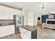 Spacious kitchen with stainless steel appliances and granite countertops at 11575 Wilson Cir, Parker, CO 80134