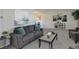 Bright living room with comfortable seating, neutral carpet and an open layout great for relaxation at 7420 Windwood Way, Parker, CO 80134