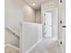 Second story hallway featuring light gray walls and carpet at 6824 Huddersfield Ln, Castle Pines, CO 80108