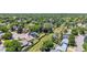 This aerial view of the home showcases its location and surrounding neighborhood at 9015 W Tanforan Dr, Littleton, CO 80123