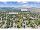 An aerial view of the home's neighborhood highlighting the proximity to Harriman Lake and Garrison & Union Park at 9015 W Tanforan Dr, Littleton, CO 80123