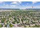 An aerial view of the area highlights the convenient access to Downtown Denver and Foothills Golf Course at 9015 W Tanforan Dr, Littleton, CO 80123