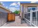 Fenced backyard features a gate for easy access, offering both privacy and security at 9015 W Tanforan Dr, Littleton, CO 80123