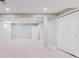Expansive basement space features neutral carpet, multiple closets, recessed lighting, and ample storage at 9015 W Tanforan Dr, Littleton, CO 80123