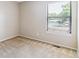 Light and bright bedroom with neutral carpet and a large window at 9015 W Tanforan Dr, Littleton, CO 80123