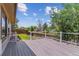 Relax and enjoy the outdoors on this lovely deck overlooking the lush green backyard at 9015 W Tanforan Dr, Littleton, CO 80123