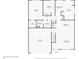 First floor layout showing a large living room, kitchen, and two-car garage at 9015 W Tanforan Dr, Littleton, CO 80123