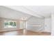 Inviting foyer featuring bright natural light and light wood floors at 9015 W Tanforan Dr, Littleton, CO 80123