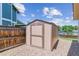 Durable outdoor shed provides extra storage space and complements the backyard at 9015 W Tanforan Dr, Littleton, CO 80123