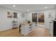 Bright and airy basement kitchen with island and hardwood floors at 5965 W Quarles Dr, Littleton, CO 80128