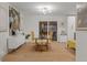 Bright dining area with glass top table and gold accents at 5965 W Quarles Dr, Littleton, CO 80128