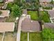 Aerial view of a home showcasing its expansive backyard and neighborhood setting at 9115 W 5Th Ave, Lakewood, CO 80226