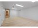 Bright basement with neutral carpet, white walls, and large closet at 9115 W 5Th Ave, Lakewood, CO 80226