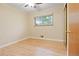 Bright bedroom featuring a window, ceiling fan, and hardwood floors at 9115 W 5Th Ave, Lakewood, CO 80226