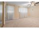 Bedroom with neutral carpet and window at 9115 W 5Th Ave, Lakewood, CO 80226