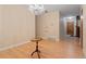 Bright dining room with hardwood floors, elegant chandelier, and neutral wall color at 9115 W 5Th Ave, Lakewood, CO 80226