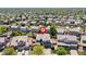 A picturesque aerial view showcases this home nestled within a vibrant neighborhood at 2509 S Bahama Way, Aurora, CO 80013
