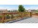 Relax on this wooden deck with views of the backyard and surrounding neighborhood at 2509 S Bahama Way, Aurora, CO 80013