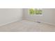 Bedroom with neutral carpet and window with a view at 2509 S Bahama Way, Aurora, CO 80013