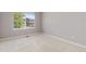 Bedroom with neutral carpet and large window at 2509 S Bahama Way, Aurora, CO 80013