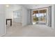 Cozy living area featuring natural light from sliding doors to the deck and view of the backyard at 2509 S Bahama Way, Aurora, CO 80013