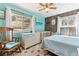 Charming bedroom with unique decor and bright natural light, featuring scenic views at 5384 Olde Stage Rd, Boulder, CO 80302