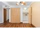 Cozy living space with wood flooring, closet space, and in-unit laundry at 7040 W 20Th Ave # 206, Lakewood, CO 80214