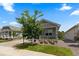 Inviting home with well-manicured lawn, flower beds, and a cozy front porch at 15802 Xanthia Way, Thornton, CO 80602