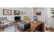 Cozy home office with a classic desk setup and a comfortable chair, perfect for a productive workspace at 15802 Xanthia Way, Thornton, CO 80602