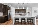 Modern kitchen with stainless steel appliances, granite countertops, and a large island at 15802 Xanthia Way, Thornton, CO 80602