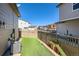 Fenced backyard features an artificial lawn, perfect for low-maintenance outdoor enjoyment at 3075 Distant Rock Ave, Castle Rock, CO 80109