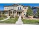 Inviting two-story townhome with well-manicured lawn and covered front entrance at 3075 Distant Rock Ave, Castle Rock, CO 80109