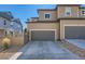 Attached two car garage, with driveway parking and low maintenance landscaping at 3075 Distant Rock Ave, Castle Rock, CO 80109