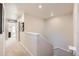 Upstairs hallway with carpet flooring and neutral wall paint at 3075 Distant Rock Ave, Castle Rock, CO 80109