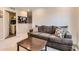 Cozy living room features comfortable seating and a coffee table at 3075 Distant Rock Ave, Castle Rock, CO 80109