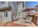 Outdoor deck with seating, an umbrella, and a beautiful view of the surroundings at 6462 Freeport Dr, Highlands Ranch, CO 80130