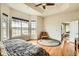 Large bedroom featuring hardwood floors, vaulted ceilings, lots of light and mountain views at 16399 Somerset Dr, Broomfield, CO 80023