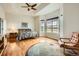 Spacious main bedroom featuring vaulted ceilings, large windows, and a cozy sitting area at 16399 Somerset Dr, Broomfield, CO 80023