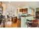 Kitchen with island, granite countertops, stainless steel appliances, and breakfast bar at 16399 Somerset Dr, Broomfield, CO 80023