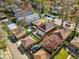 Overhead view of the home, showcasing the yard, deck, mature trees and blooming tree at 2772 Julian St, Denver, CO 80211