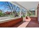 Inviting front porch with brick accents and ample space for relaxing while enjoying neighborhood views at 2772 Julian St, Denver, CO 80211