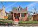 Beautiful brick home with a welcoming front porch and lovely landscaping at 2772 Julian St, Denver, CO 80211