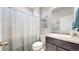 Cozy bathroom featuring a shower and tub, with a toilet, vanity, and sink at 3885 Sandoval St, Brighton, CO 80601