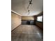 Empty living room featuring stone fireplace, neutral walls, tile flooring, and natural light at 21041 E Ida Ave, Centennial, CO 80015