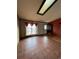 Inviting living room featuring tile flooring and a sun roof with neutral paint colors at 21041 E Ida Ave, Centennial, CO 80015