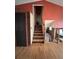 Staircase featuring wood flooring and neutral paint colors at 21041 E Ida Ave, Centennial, CO 80015