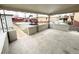 Open back patio with gray brick surround and a view of the snowy backyard at 3578 Ivanhoe St, Denver, CO 80207