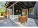 Charming outdoor patio includes a dining table with a neutral-colored rug at 734 N Downing St, Denver, CO 80218